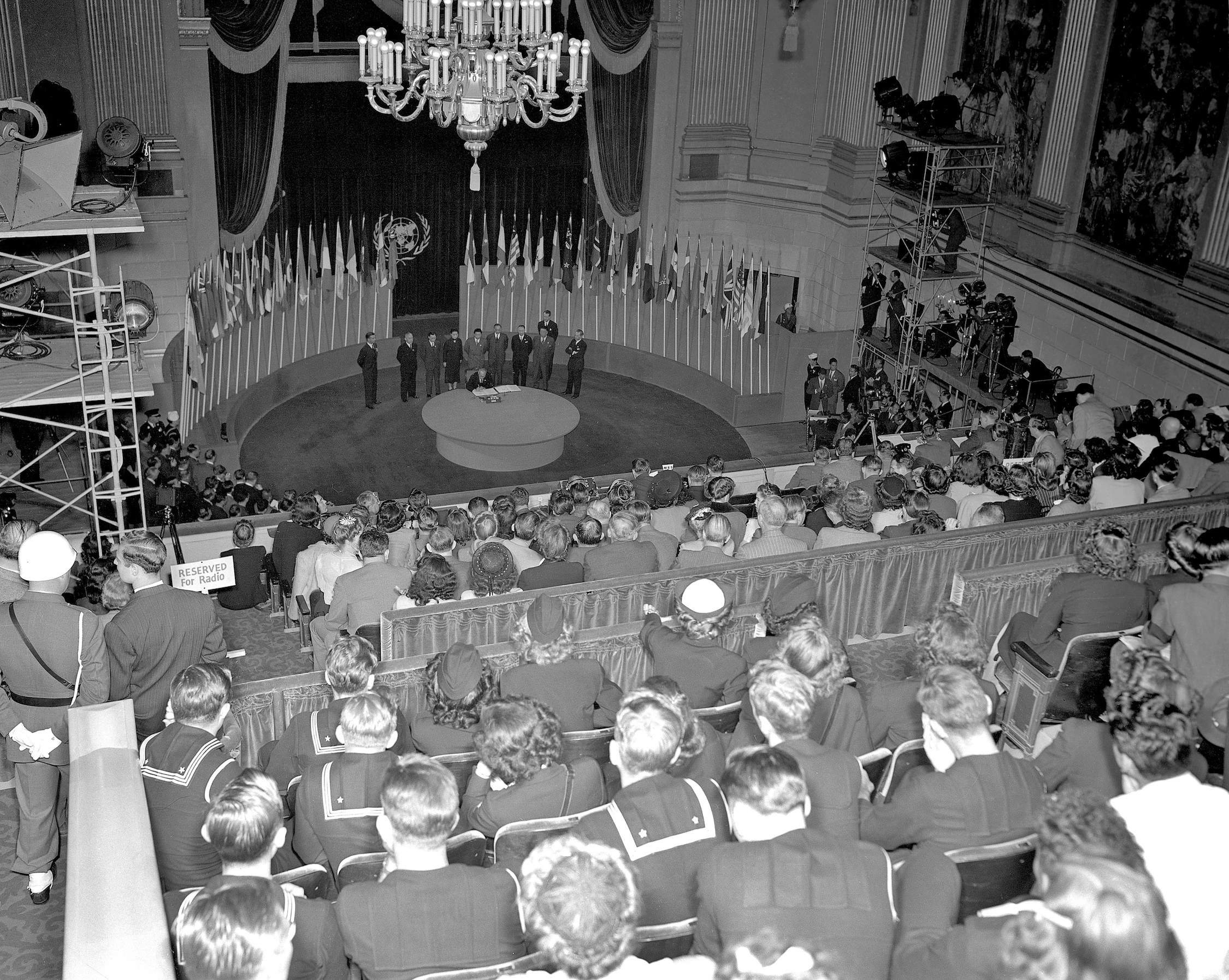 Photo by UN Photo/Rommel Chinese delegation becomes the first nation to sign the UN Charter and the Statute of the International Court of Justice.